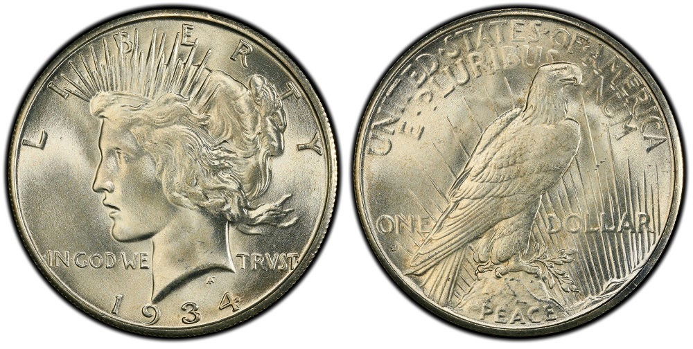 1934-S Peace Dollar vs 1934-P comparison showing mint mark location above eagle's tail feathers